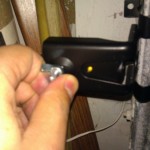 Screwing in the safety sensor. Notice it is the correct location.